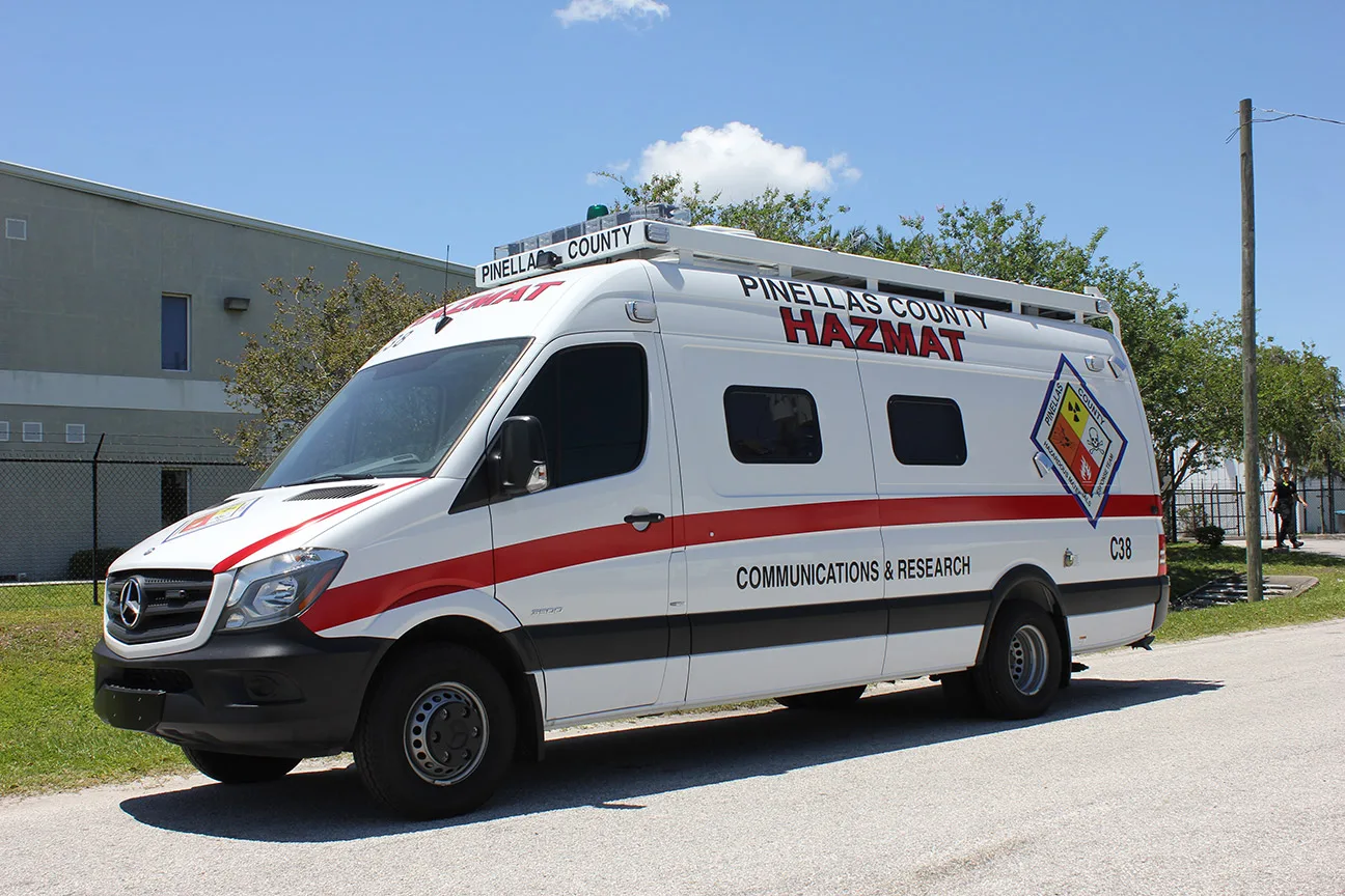 EOC C-24 Small Mobile Command vehicle parked near the Frontline Communications building.