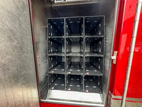 Close-up of charging dock rack inside compartment.