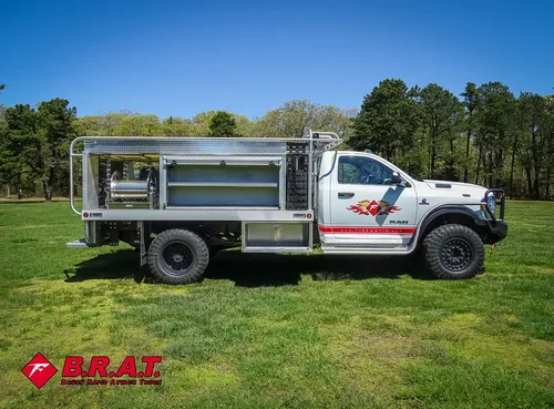 Side profile with multiple open shelves on utility body.