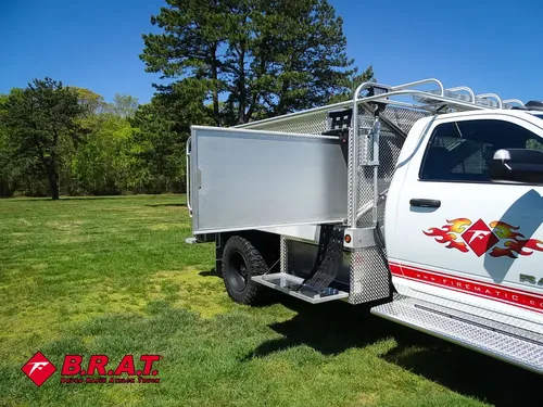 Large side access panel open outward beside rear compartment.