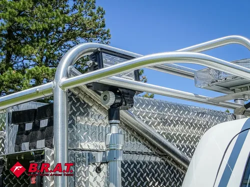 Roof rack rails and top-mounted scene lights.