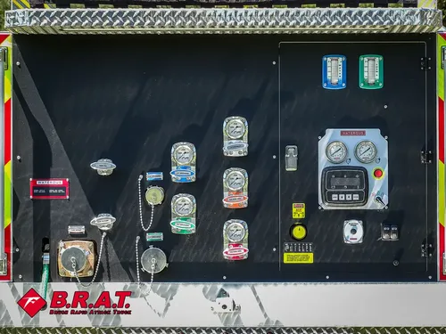 Rear pump control panel with gauges, switches, and ports.