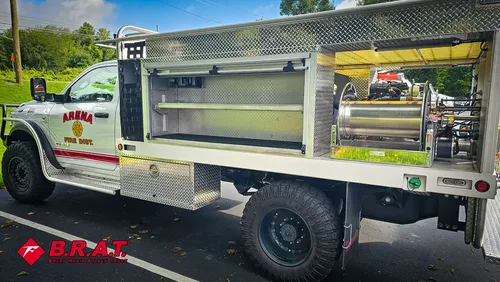 Driver-side rear compartment open showing long shelf.