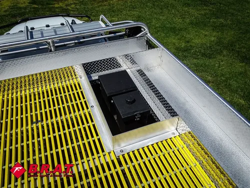 Top deck grate and black access hatch cover.