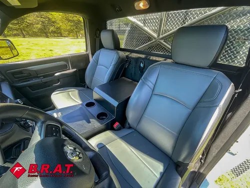 Front seats and center console viewed from passenger side.