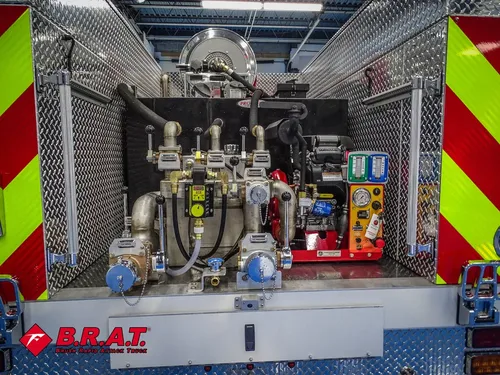 Rear pump bay wide view with manifolds, valves, and gauges.