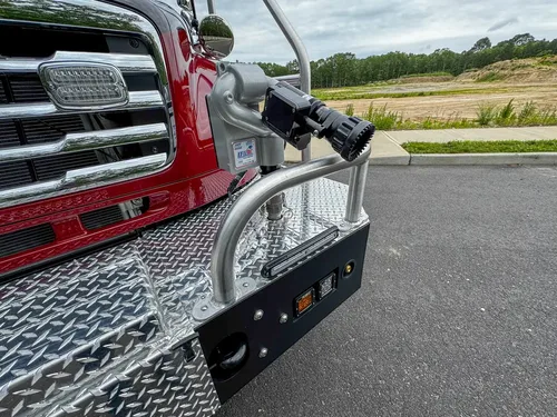 Diamond-plate body trim and step detail outdoors, photo 209 of 303.