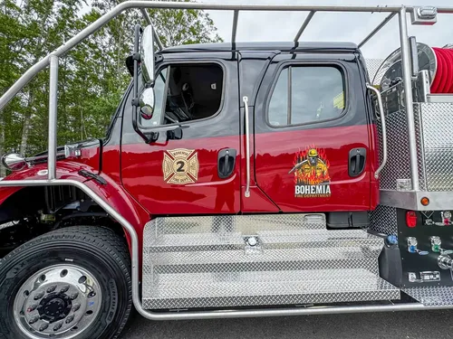 Head-on front view showing bumper and grille, photo 213 of 303.