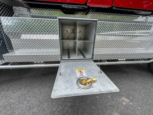 Diamond-plate body trim and step detail outdoors, photo 249 of 303.