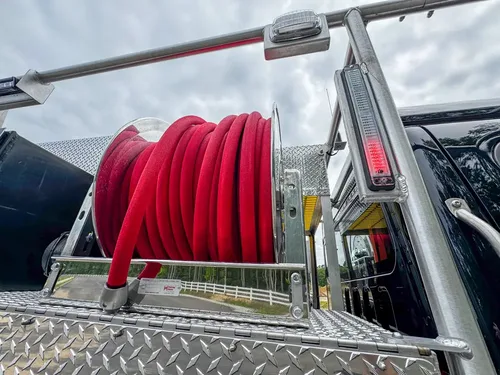 Red brush apparatus parked in front-left view outdoors, photo 251 of 303.