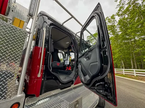 Open body compartment with storage area detail, photo 276 of 303.