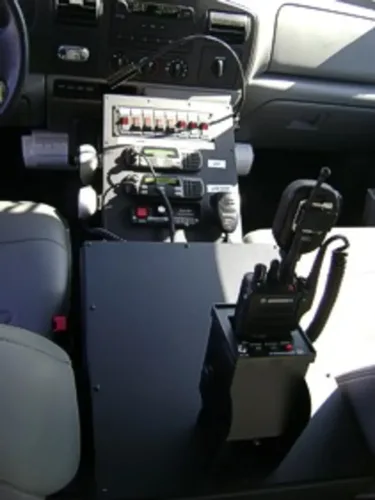 Cab interior view with dashboard, steering wheel, and front seats.