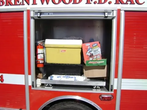 Rear interior access area with fold-out shelves and equipment.