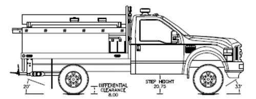 Exterior view of small fire truck showing cab, body compartments, and wheel/tire area.