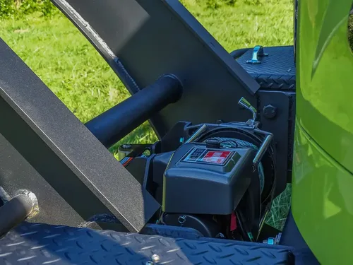 Portable battery pack mounted on rear cage frame.