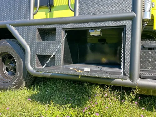 Long lower side compartment door opened outward.