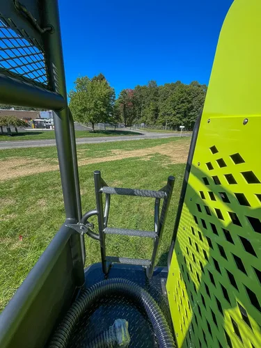Walkway exit at rear corner with ladder and side rail.
