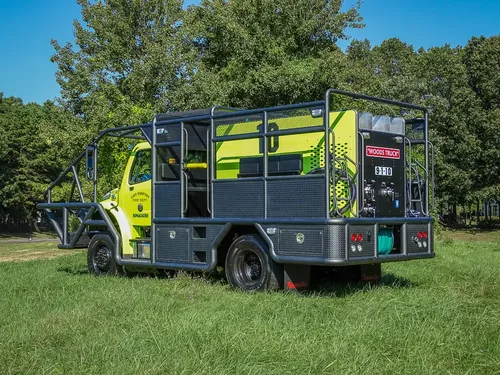 Rear passenger-side three-quarter view of utility body.