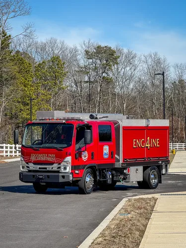 Front-left side view showing crew cab and enclosed body.