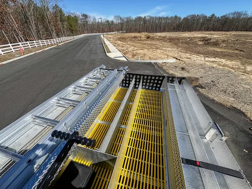 Top deck looking rearward across grating and side rail.