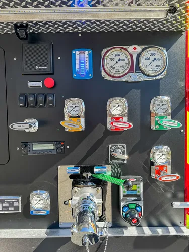 Right side of pump panel close-up showing labeled controls and gauges.