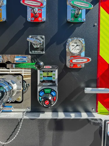 Pump panel close-up with rotary control and digital display.