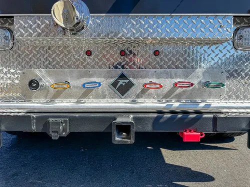 Lower rear step and connector labels with underside view.