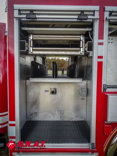 Rear center compartment interior showing shelf and mounting points.