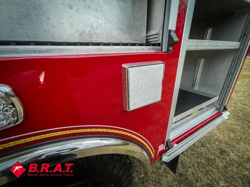 Small side access panel closed near open shelf compartment.