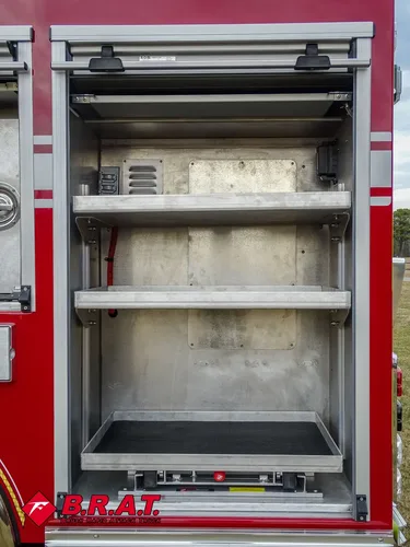 Open side compartment with stacked shelves and empty interior.