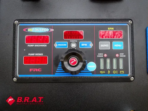 Engine/pump control module close-up with buttons and status indicators.