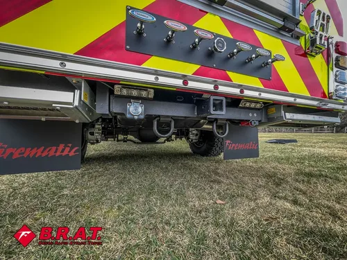 Underside angle of rear body showing fold-out bracket assembly.