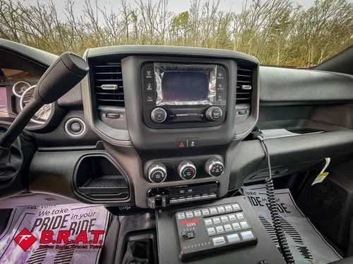 Center dashboard close-up with infotainment screen and climate controls.