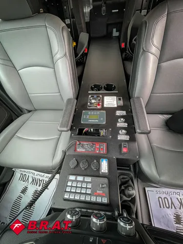 Center console close-up with radio controls and toggle switches.