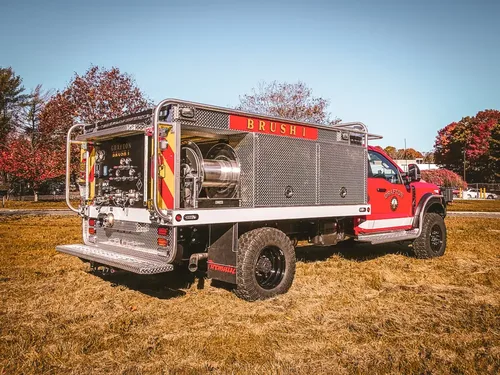 Rear-right angle with open side bays and rear pump controls visible.