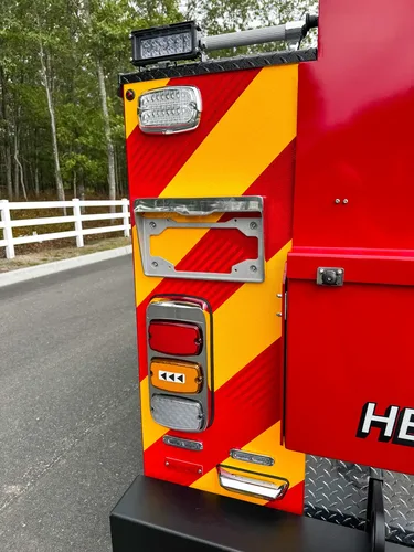 Opposite rear corner taillight and chevron panel detail.