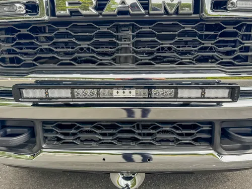 Close-up of front grille and lower warning light bar.
