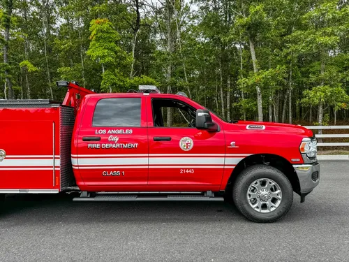 Driver-side cab and body side view with door markings.