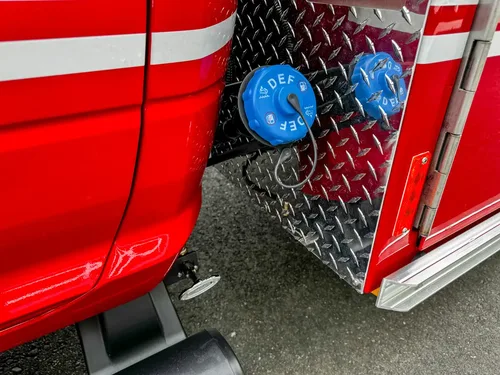 Side inlet connection and step area below body panel.