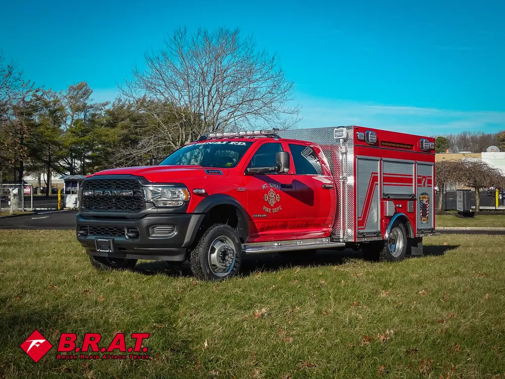 Front-left three-quarter exterior view of red fire police utility truck.