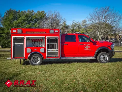 Right-side profile with multiple compartments open and trays extended.