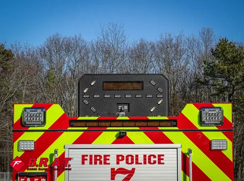 Rear panel close-up with electronic message board and warning lights.