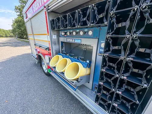 Wide side view of CFS5.5 panel and full SCBA cylinder rack.