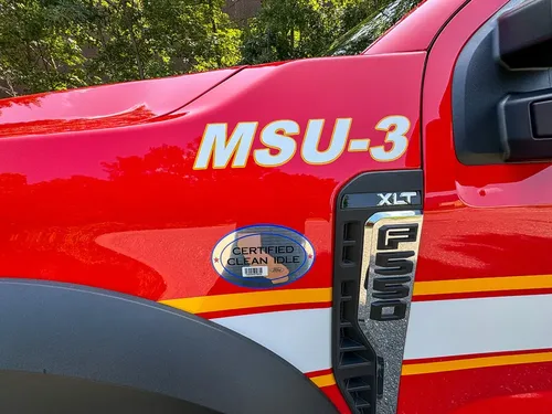 Door close-up with white MSU-3 lettering and side badges.