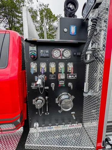 Rear-right exterior view of red brush truck, photo 14 of 179.