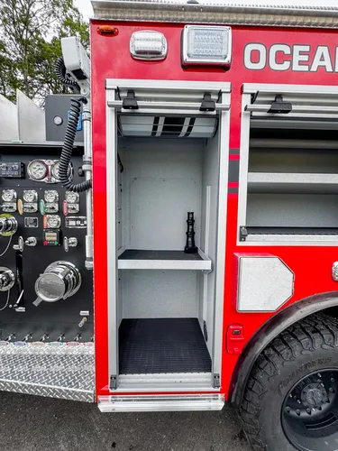 Red brush truck front-left exterior view, photo 21 of 179.