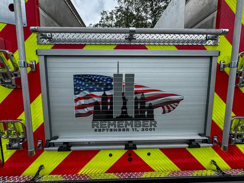 Rear chevron and taillight detail on brush truck, photo 27 of 179.