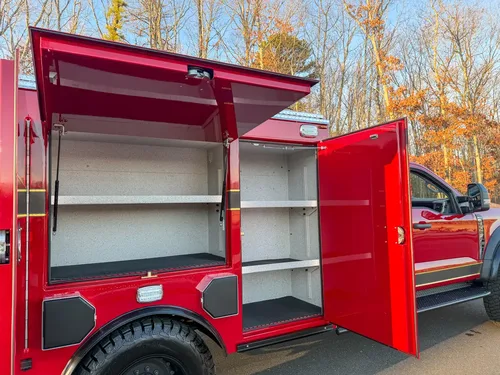 Two open left-side compartments with shelves and raised top door.