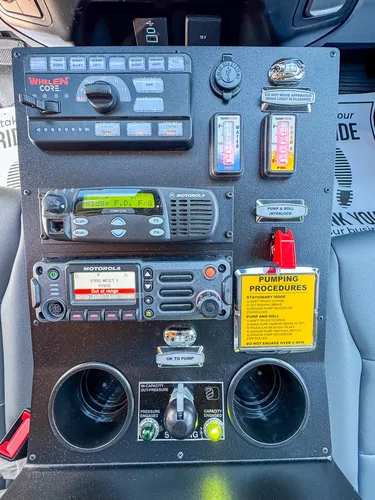 Center dashboard close-up with radio stack and labeled procedure cards.