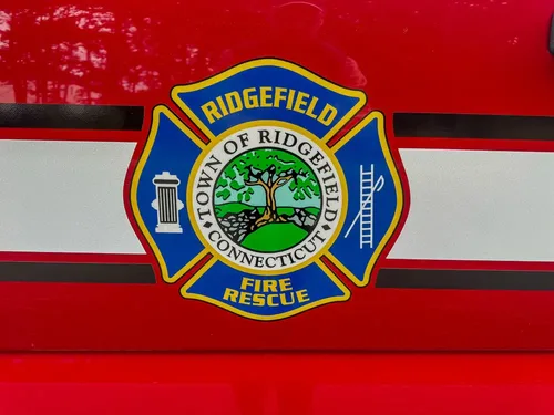 Door emblem close-up with Ridgefield Fire Department crest.